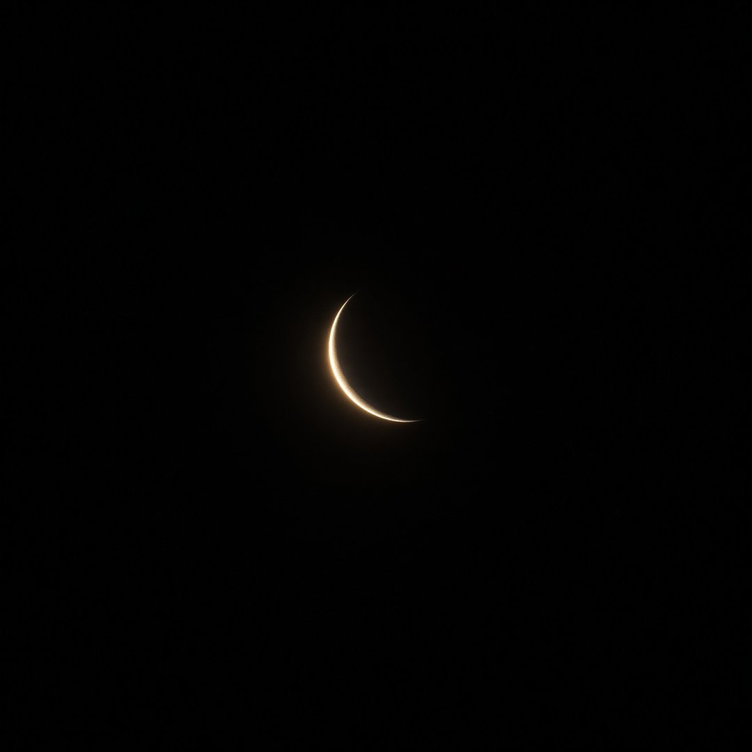 Black Moon Minimal Black DP – A thin crescent moon glowing on a pitch black sky, ultra minimal. A free HD black DP for WhatsApp, Instagram a… (Black DPS)